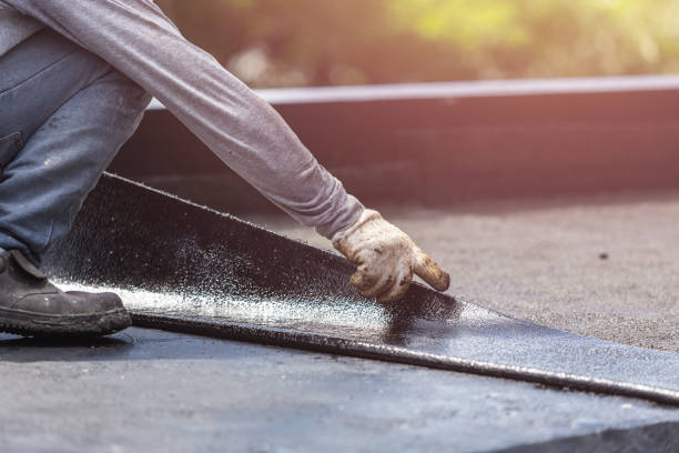 Professional Exterior Waterproofing technician working in Weston, MI